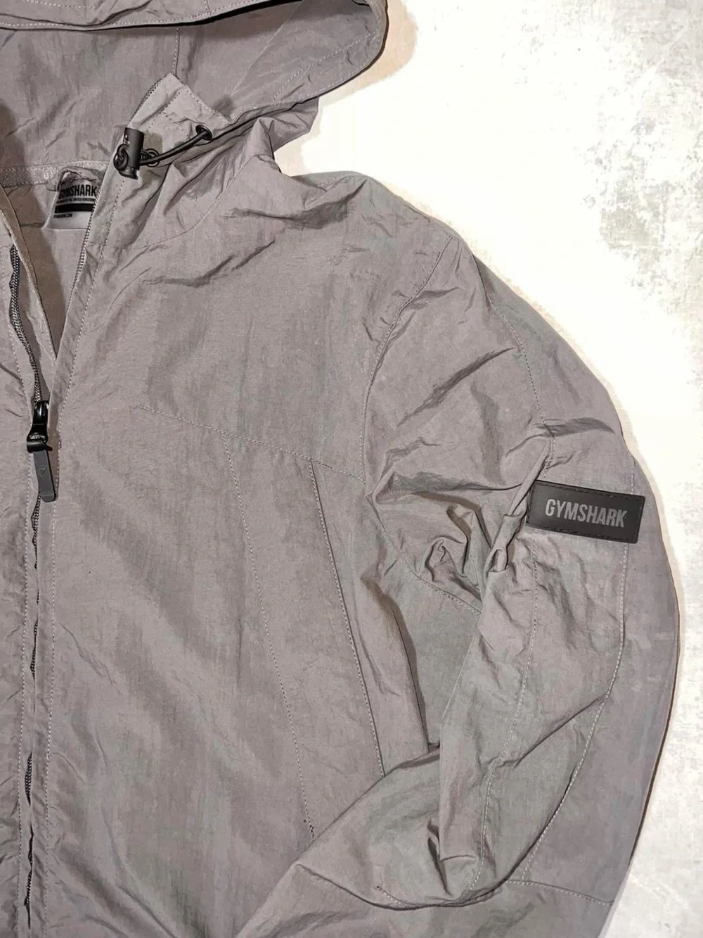 Gymshark Lightweight Hooded Jacket in Charcoal